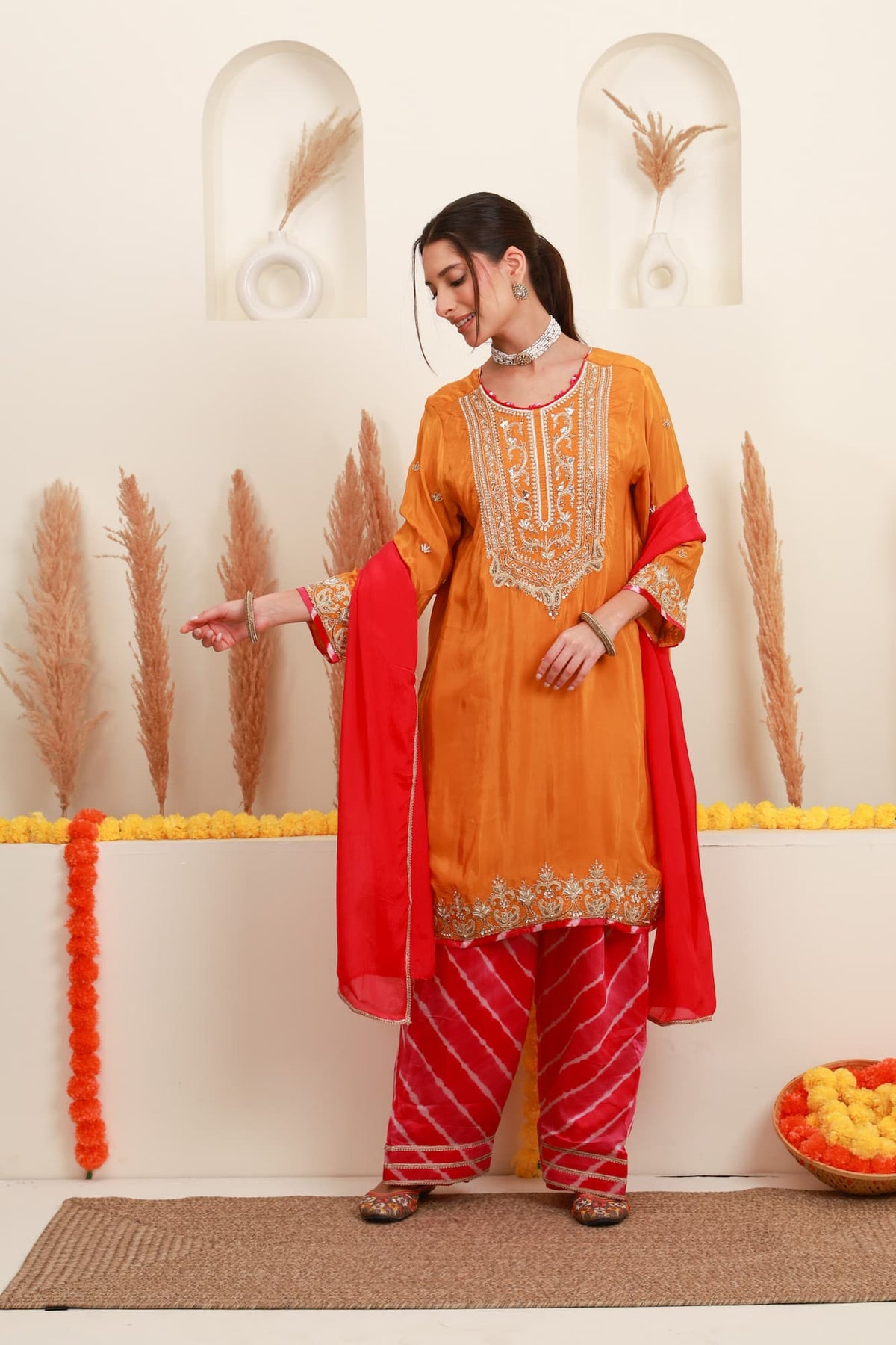 Orange and red embroidered kurta with Farshi Salwar and red dupatta5