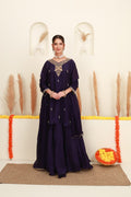 Purple embroidered flared skirt set for women with antique-gold detailing and sheer dupatta front