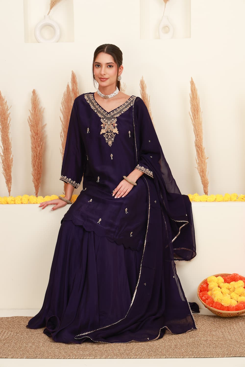 Purple embroidered flared skirt set for women with antique-gold detailing and sheer dupatta