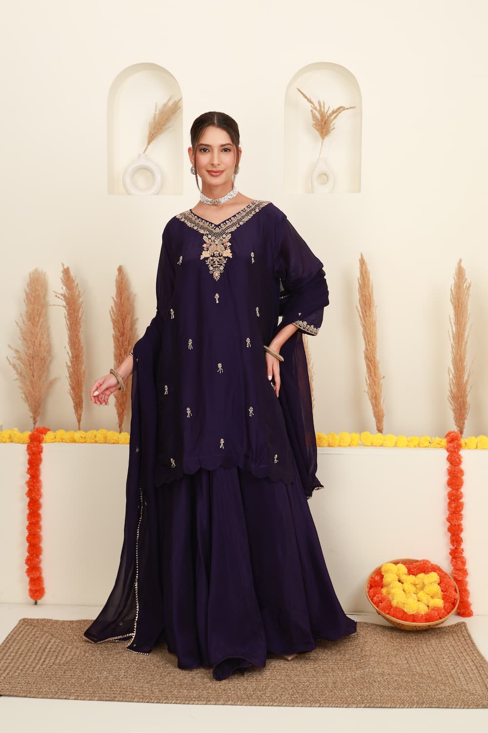 Purple embroidered flared skirt set for women with antique-gold detailing and sheer dupatta front 1