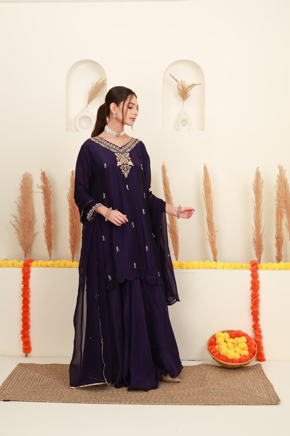 Purple embroidered flared skirt set for women with antique-gold detailing and sheer dupatta front 3
