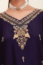 Purple embroidered flared skirt set for women with antique-gold detailing and sheer dupatta