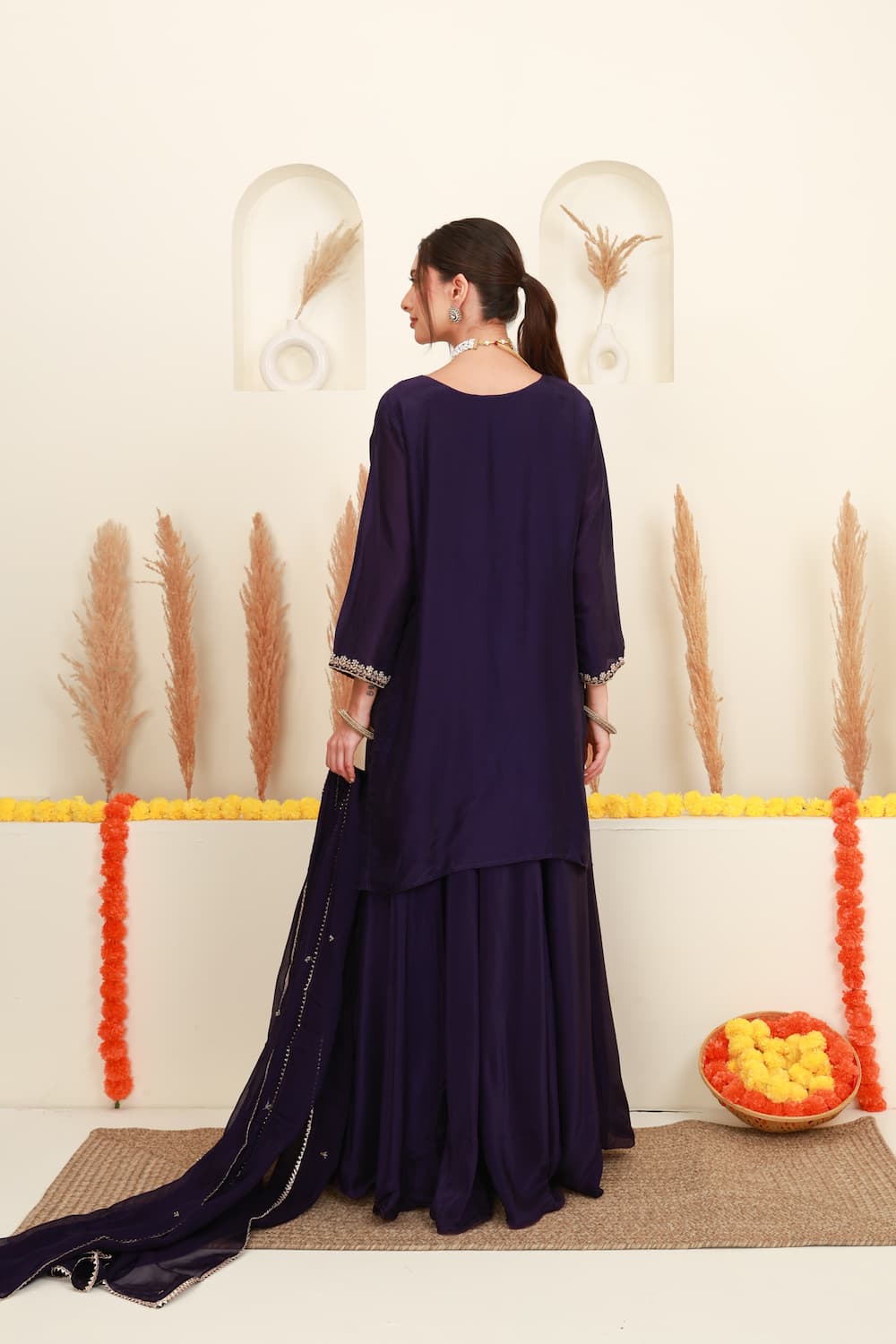 Purple embroidered flared skirt set for women with antique-gold detailing and sheer dupatta