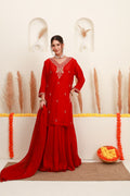 Red embroidered flared skirt set with antique-gold detailing and sheer dupatta