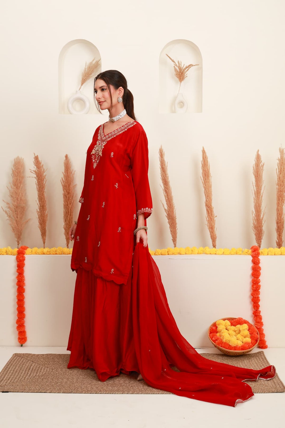 Red embroidered flared skirt set with antique-gold detailing and sheer dupatta2