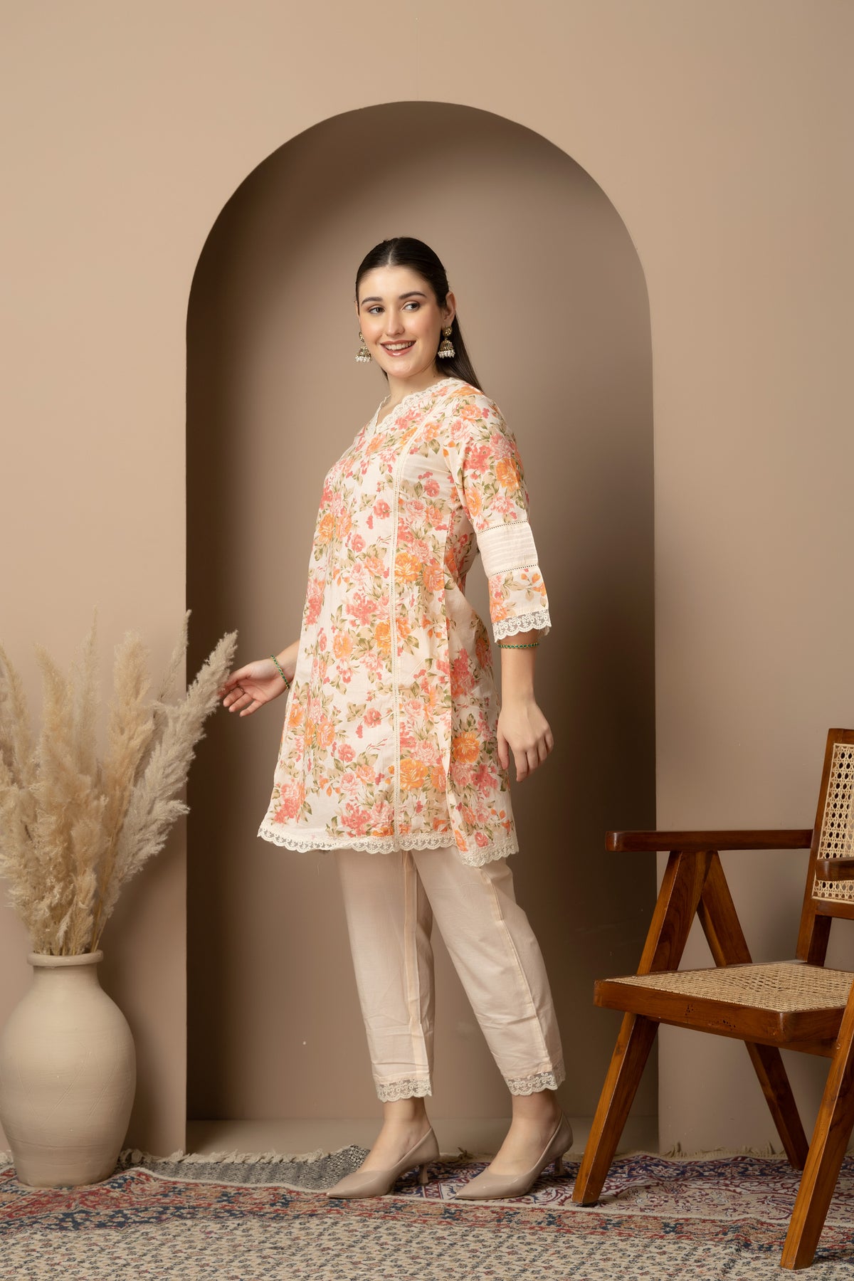 Side view of ivory floral printed kurta set