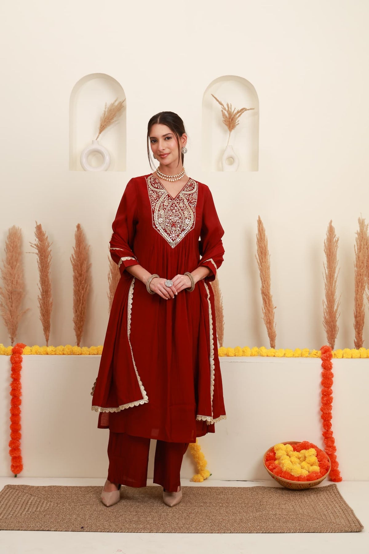 Wine red embroidered flared kurta set with embellished neckline